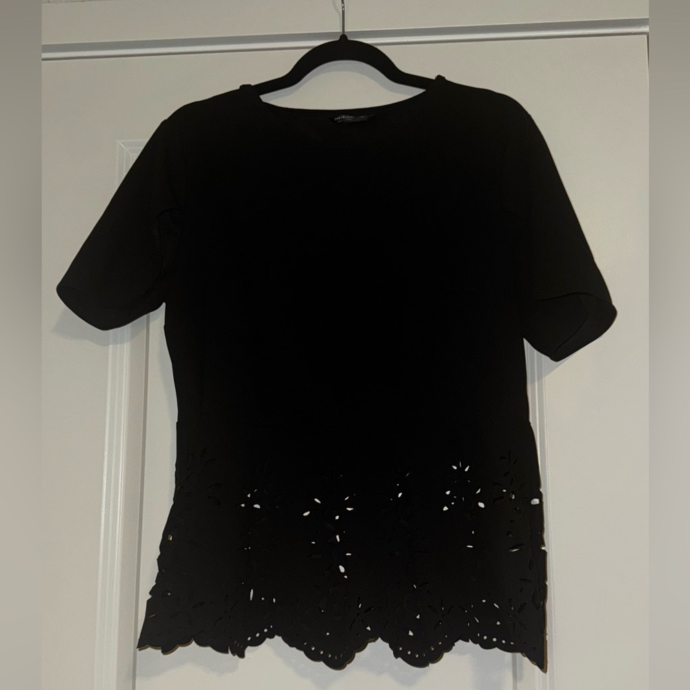Black top with lace cut out detail